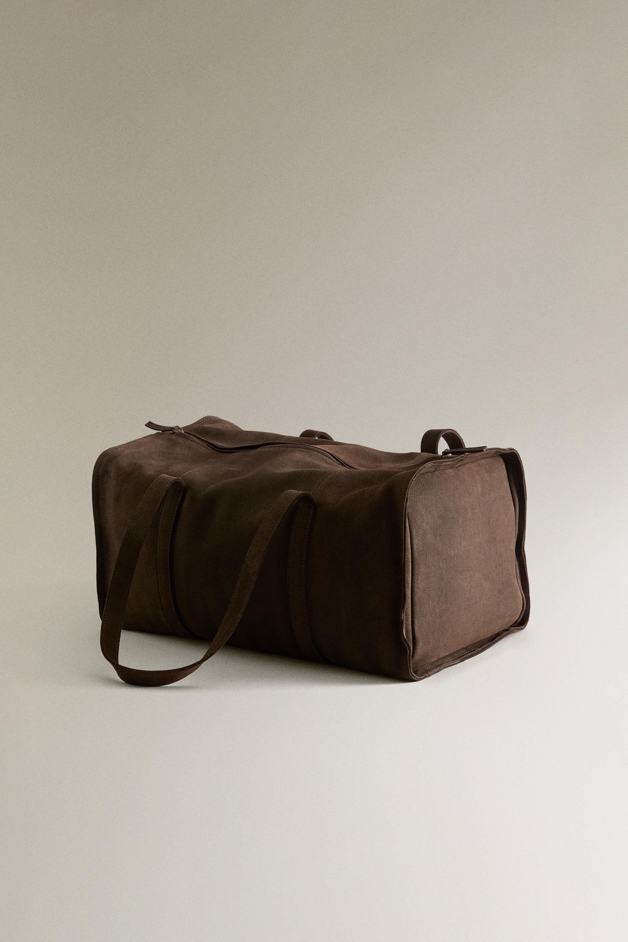 FADED LEATHER TRAVEL BAG